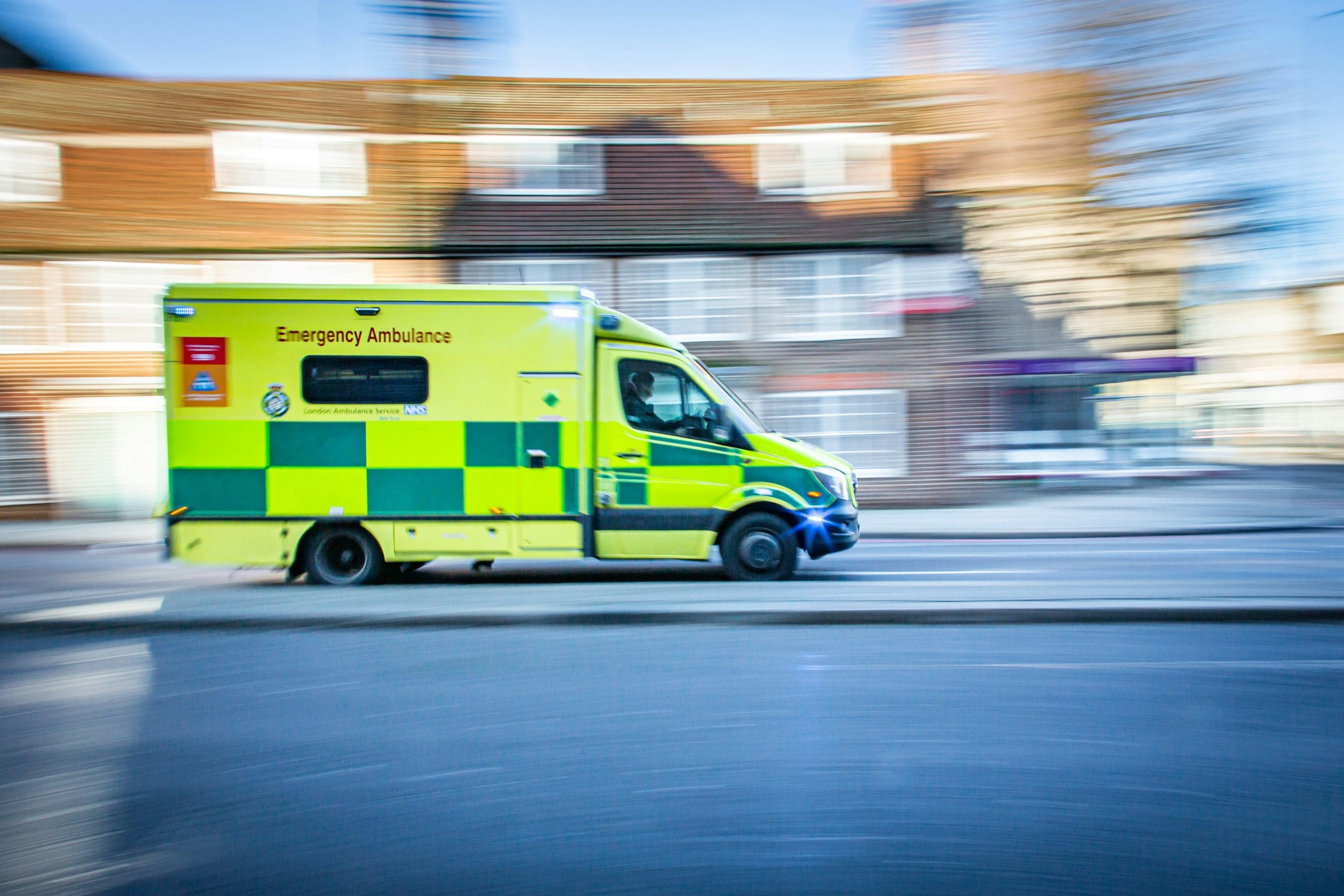ambulance traveling at speed to reference the usability of Dedalus OneResponse ambulance mobile EPR solution